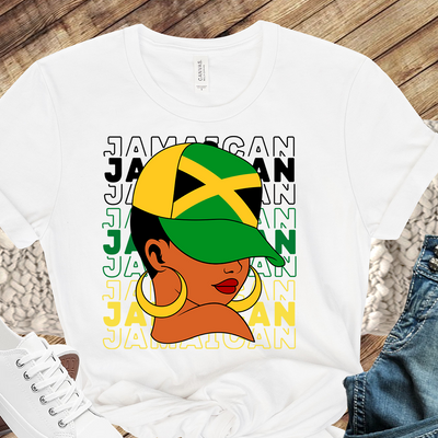 Image of a person wearing a Jamaica color T-shirt, showcasing the vibrant black, green, and gold colors that represent the strength, lush vegetation, and sunshine of the island. The T-shirt serves as a symbol of Jamaican culture and heritage.