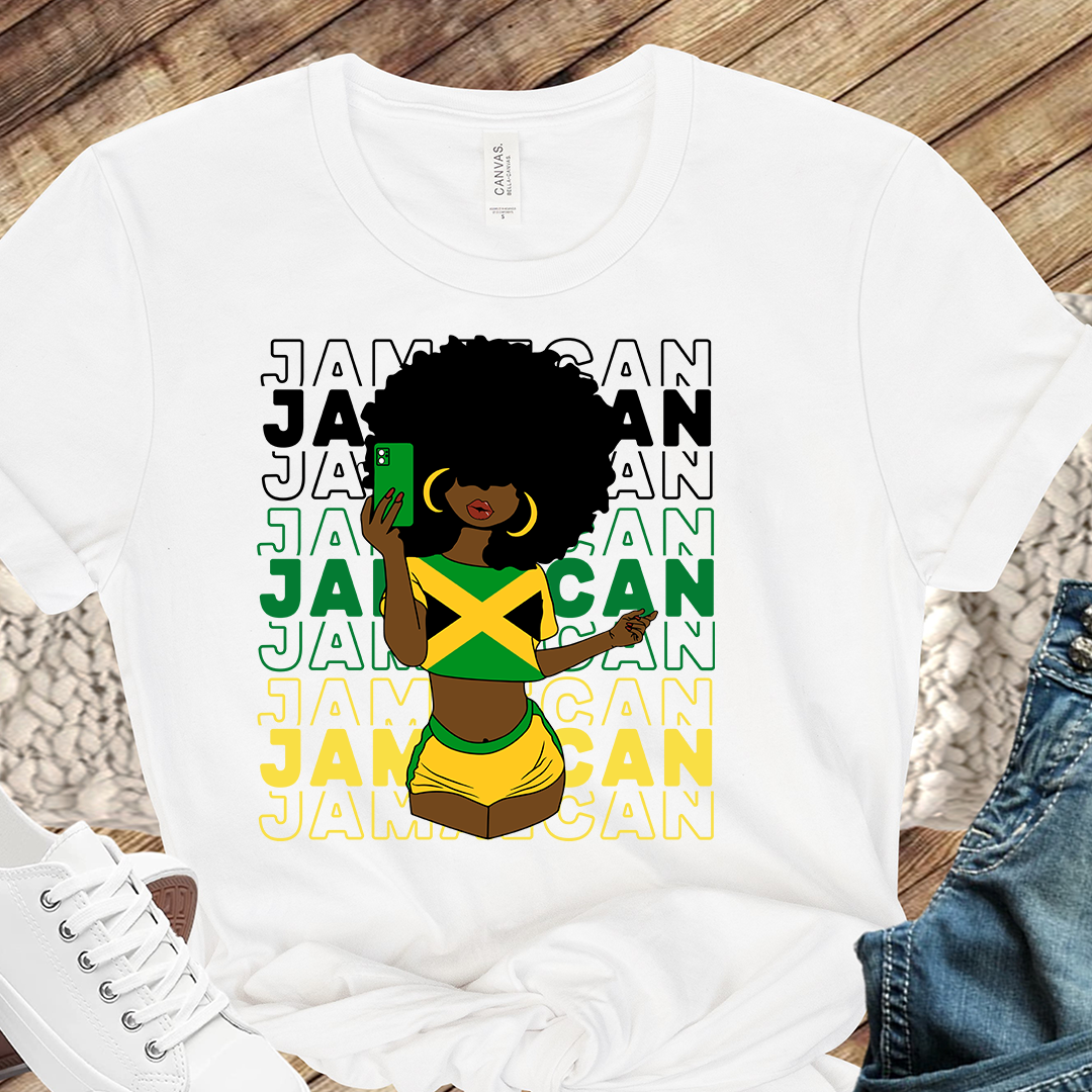 Image of a person wearing a Jamaica color T-shirt, showcasing the vibrant black, green, and gold colors that represent the strength, lush vegetation, and sunshine of the island. The T-shirt serves as a symbol of Jamaican culture and heritage.